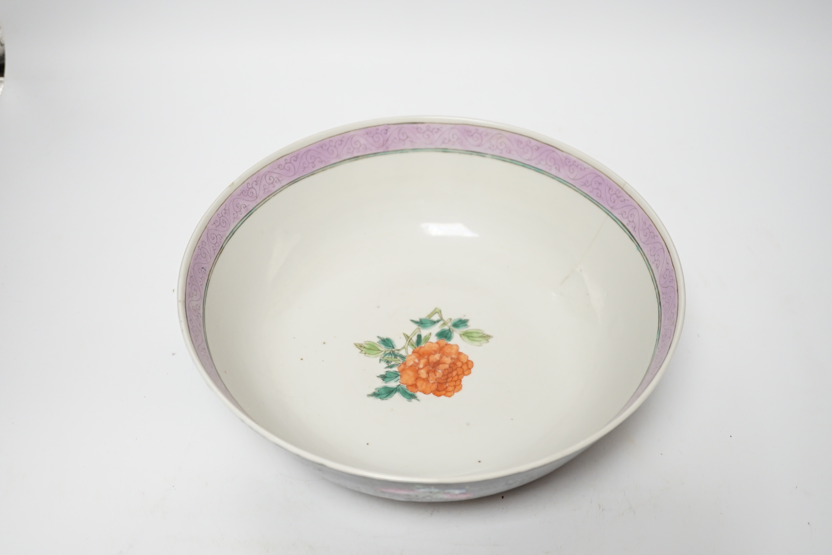 A 19th century Chinese famille noire bowl, 26cm diameter